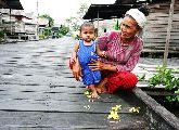 Foto: Women of the Tribe and Search of Freshwater Dolphins in Borneo
